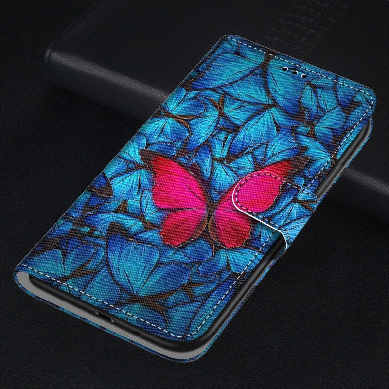 Lederhüllen Für Xiaomi 13 Roter Schmetterling. Blauer Hintergrund